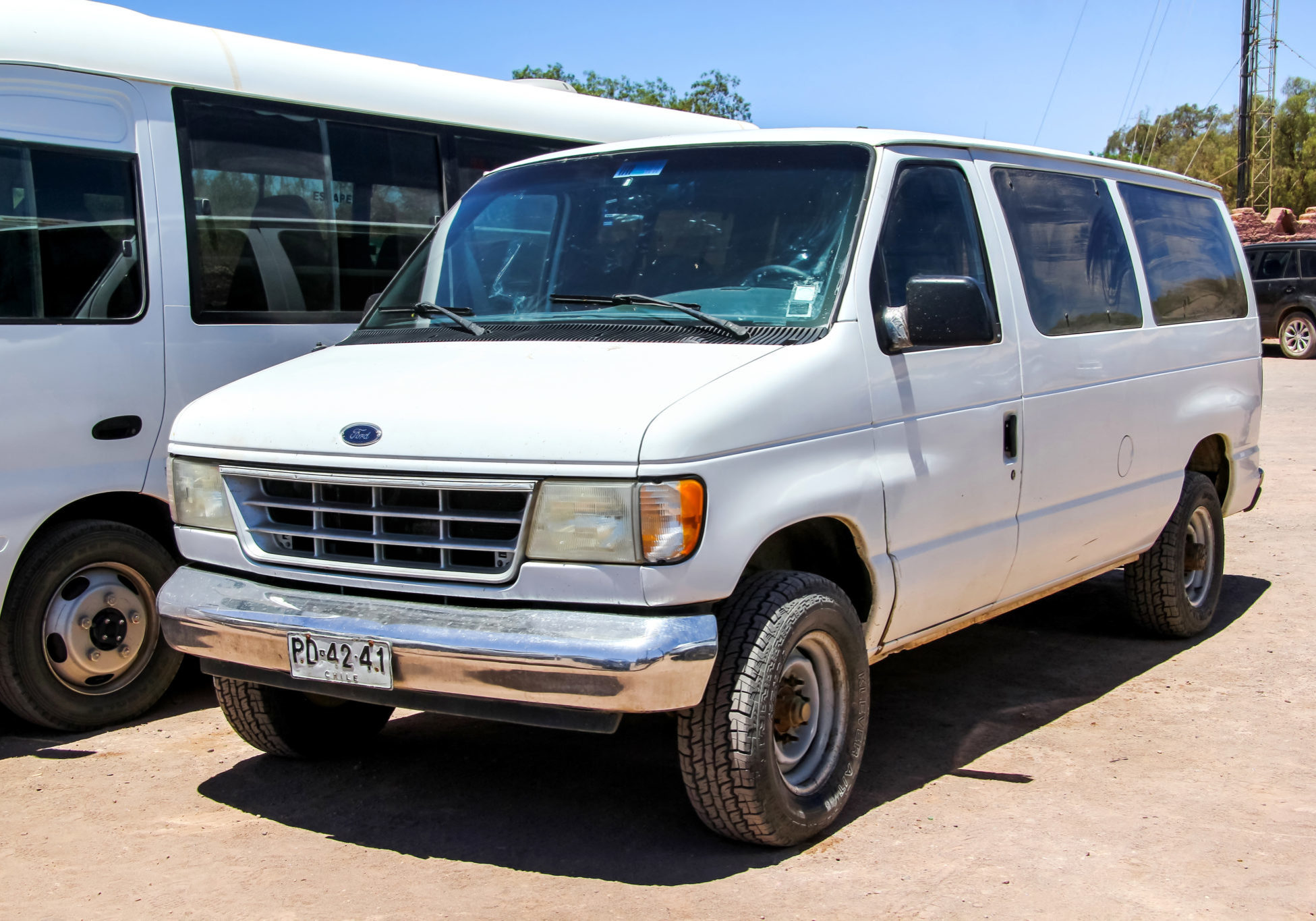 SAN PEDRO DE ATACAMA CHILE - NOVEMBER 17 2015: White van Ford E-series at the town street.